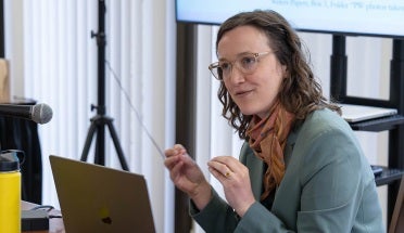 Ransom Center researcher Jayme Collins prepares to record a podcast